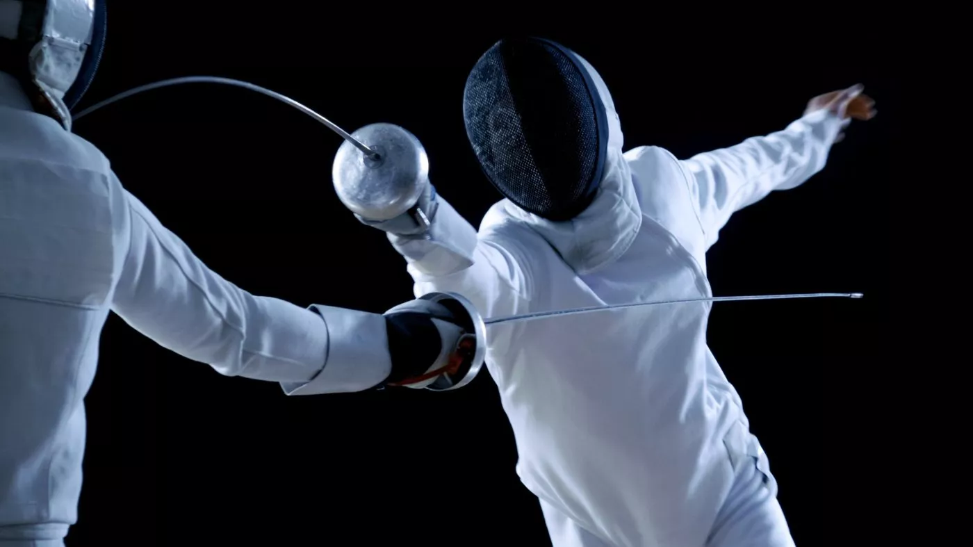 Fencing match in action