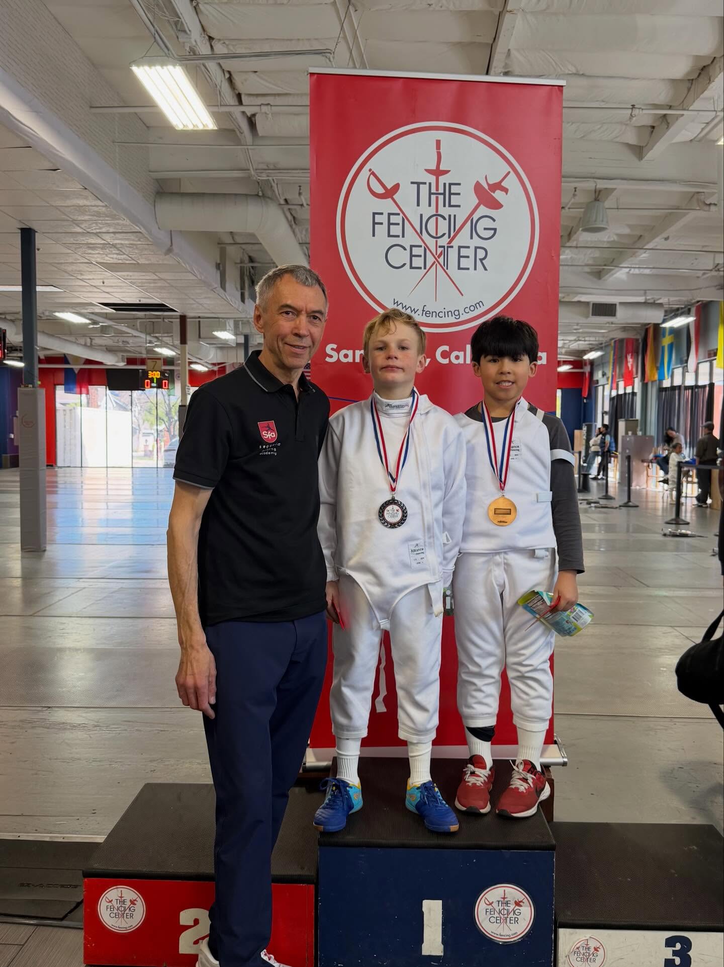 Sequoia Fencing Academy young athlete receiving a medal